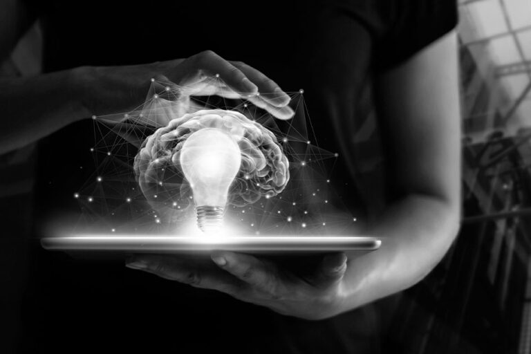 Human holding tablet with light bulb future technology, brain and network connection communication background, science, innovation and creative